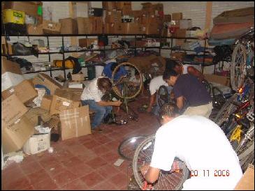 Orphanage students repairing bicycles.