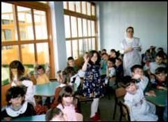 A classroom full of children at the orphanage.